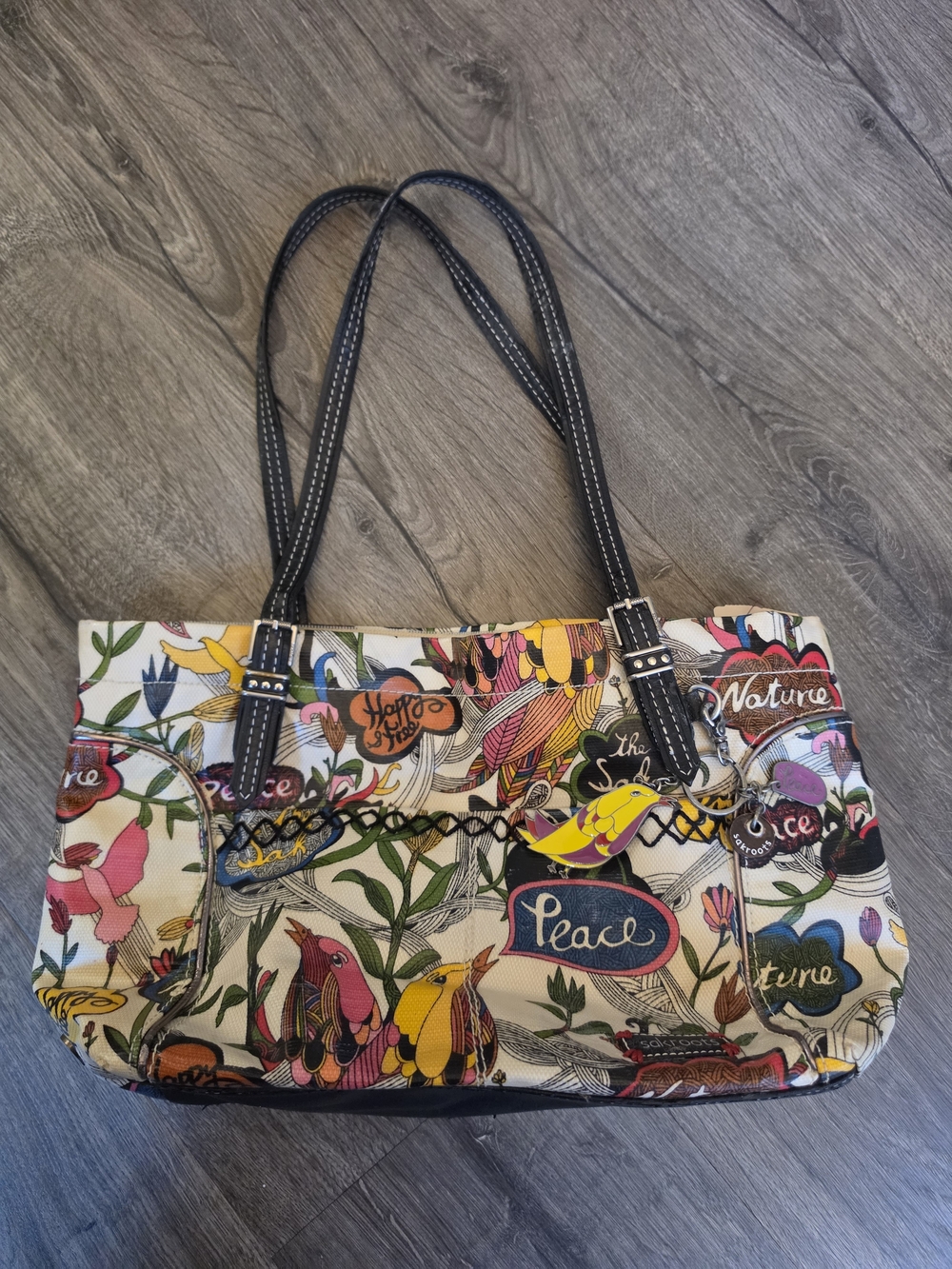 The Sak Multicolor Floral Peace Shoulder Bag with Black Handles